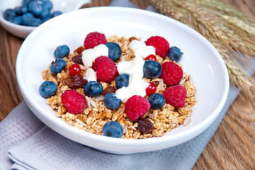 Muesli with raspberries, blueberries, beans and raisins © Kamila Cyganek