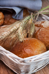 Fresh bread with ears of wheat - obrazy, fototapety, plakaty