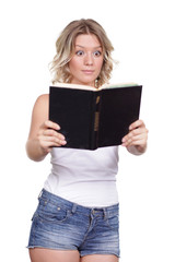 close up of a cute woman holding a book