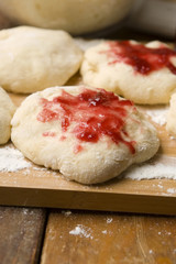 Sweet doughnuts with rose marmelade