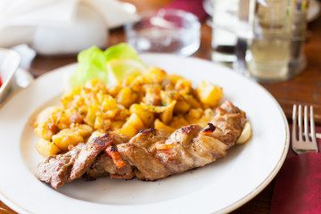 Braided pork tenderloin with garnish