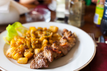 Braided pork tenderloin with garnish