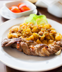 Braided pork tenderloin with garnish