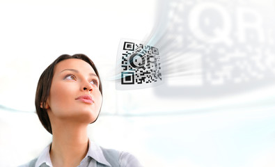 Business woman working with virtual qr code