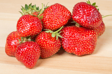 Fresh strawberries on wooden table