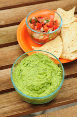 Guacamole dip with chips and salsa