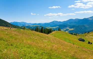 Evening mountain and family walking