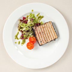 salmon steak with salad