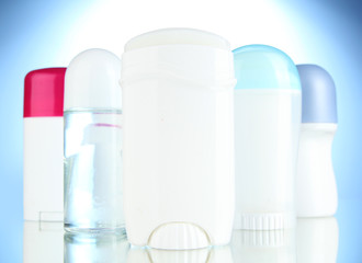 deodorant on blue background