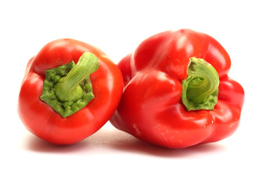 fresh red bell peppers isolated on white