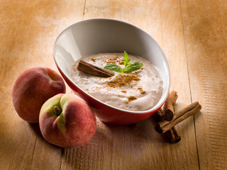 peach mousse with cinnamon and mint leaf