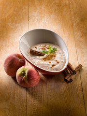 peach mousse with cinnamon and mint leaf