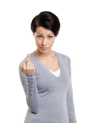 Woman shows a vulgar, obscene finger sign, isolated on white
