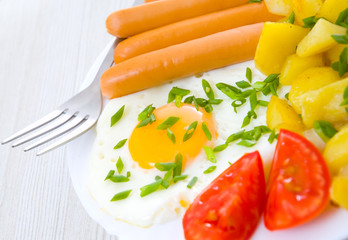 breakfast. potato, egg and sausage