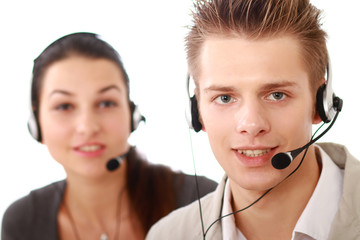 Attractive young people working in a call center