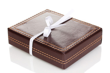 Brown box with ribbon isolated on white