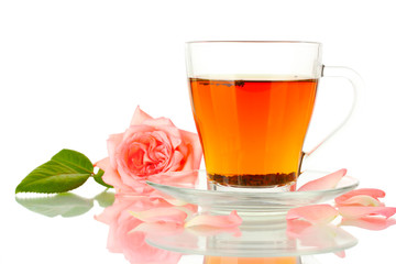 cup of tea with rose isolated on white