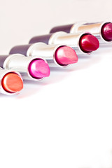 set of aligned lipsticks with red stroke