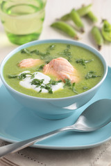 Cream of green pea soup with salmon