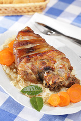 Roasted pork knuckle with vegetables