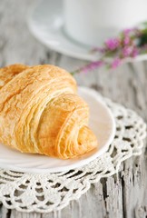 Croissants with cup of coffee