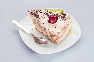 Slice of a biscuit cake  with cream