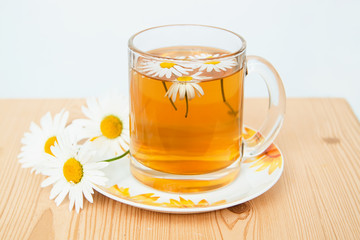 Teacup  with soothing chamomile tea