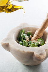 Making pesto with a mortar