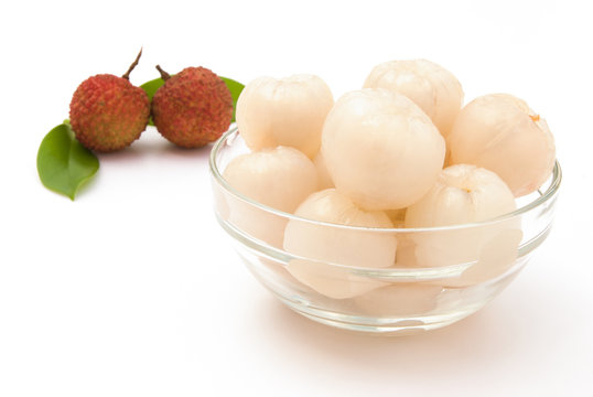 peeled lichees in a glass cup