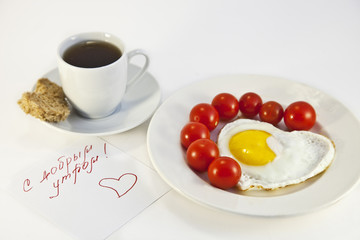 Obraz na płótnie Canvas śniadanie z jajka i pomidory