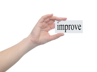 Conceptual human hand a paper banner with a black text