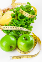 green apple with measure tape