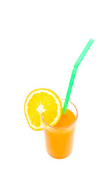 orange juice in glass on white paper