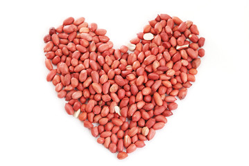 Obraz na płótnie Canvas Peanuts stacked into a heart shape
