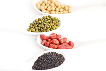 cereal in spoon on a white background.