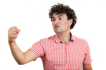 Aggressive young man, isolated on white background