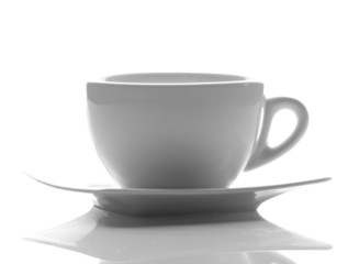 white cup on white saucer