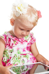 Portrait of a young girl and tablet, isolated on white