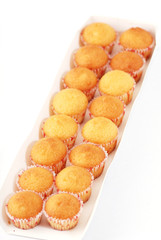 Stacked muffins isolated on white background