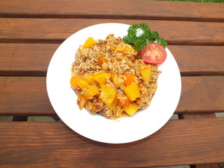 minced meat with rice, tomato and fruit