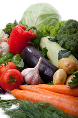 Fresh vegetables on white.