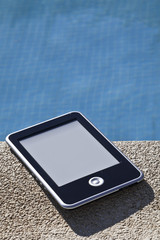 Ebook on a swimming pool background