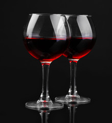 Wineglasses isolated on black