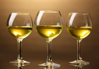 Wineglass on brown background