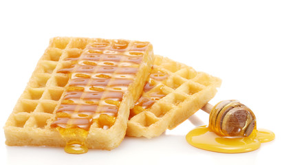 belgium waffles with honey isolated on white