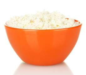 cottage cheese in orange bowl isolated on white