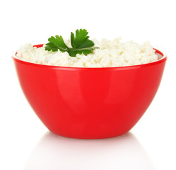 cottage cheese with parsley in red bowl isolated on white
