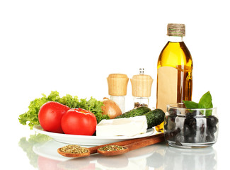 Ingredients for a Greek salad isolated on white background