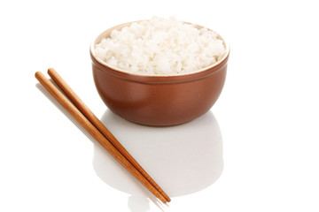 Bowl of rice and chopsticks isoalted on white