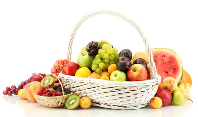 Assortment of exotic fruits and berries in baskets isolated